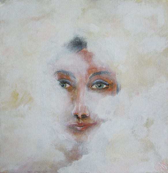 Portrait of a woman's face in mist or clouds